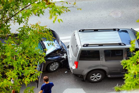 automobile crash accident on street, damaged cars after collision in city